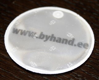 Pyöreä heijastin logolla Byhand